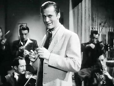 "Das singende Haus": Szenenfoto mit Curd Jrgens als Bandleader Hans Storch; mit freundlicher Genehmigung von Pidax Film, welche die Komdie am 10. Juli 2025 auf DVD herausbrachte.