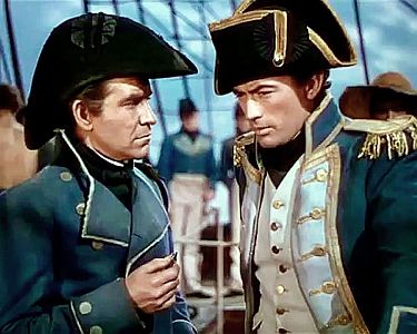 "Des Knigs Admiral": Szenenfoto mit Gregory Peck als HoratioHornblower und Robert Beatty als Leutnant William Bush; mit freundlicher Genehmigung von "Pidax Film", welche das Abenteuer Anfang September 2022 auf DVD herausbrachte.