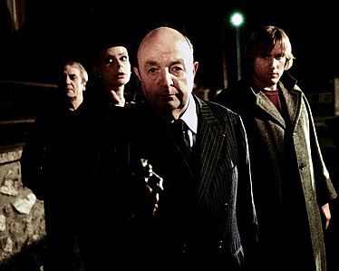 "Den Mrder trifft man am Buffet": Szenenfoto mit Bernard Blier als Inspektor Morvandiau: mit freundlicherGenehmigung von "Pidax Film", welche die rabenschwarze Komdie im April 2025 auf DVD herausbrachte.