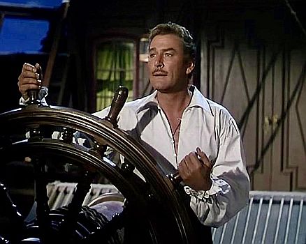 "Gegen alle Flaggen" (1952, "Against All Flags"): Szenenfoto mit Errol Flynn als englischer Offizier der Kriegsmarine, Brian Hawke; mit freundlicher Genehmigung von "Pidax Film", welche das Abenteuer Mitte Mai 2025 auf DVD herausbrachte.