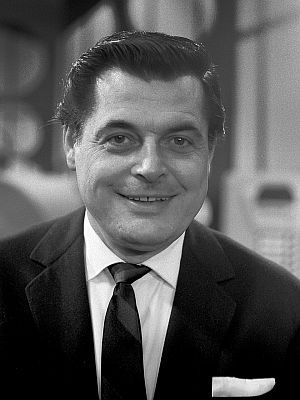 Gerhard Wendland am 8. Februar 1963 in der niederlndischen Ausgabe der "Rudi-Carrell-Show"; Rechteinhaber: Nationaal Archief (Den Haag, Rijksfotoarchief; Bestandsnummer: 914-8028); Urheber/Fotograf: Jac de Nijs / Anefo; Quelle: Wikimedia Commons (Ausschnitt des Originalfotos); Lizenz:  CC BY-SA 3.0 NL bzw. CC0 1.0 (Verzicht auf das Copyright)